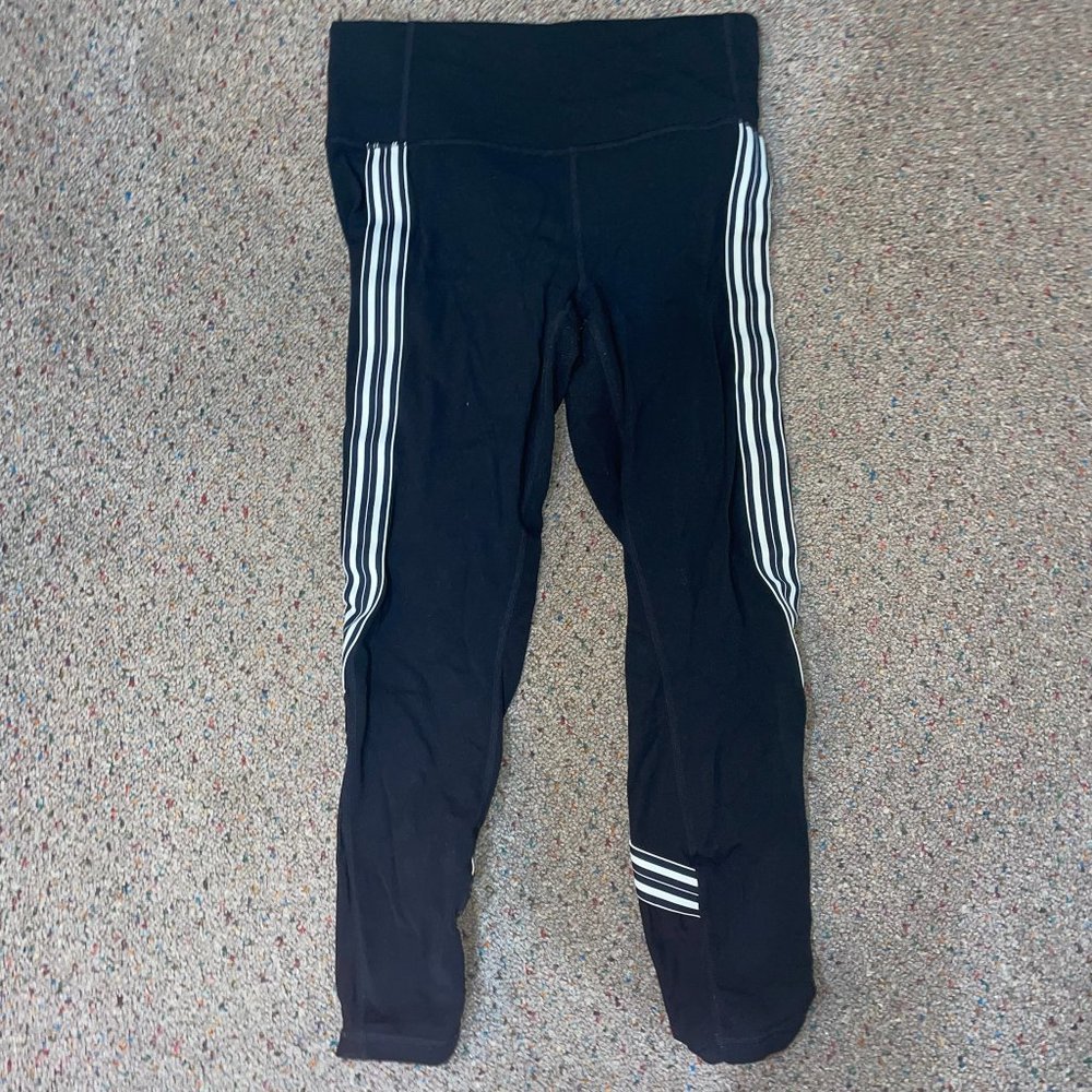 Athleta leggings with stripes down side size medium